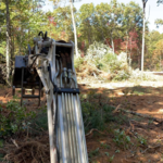 Excavator use to clear trees and brush for new construction.