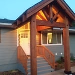 Glu lam timber entry cover rough sawn Timbers. Rustic NW feel