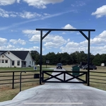 Poolville metal fence and entrance