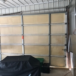 Before image of broken door without motor.