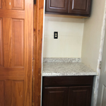 Old pantry replacement with countertop and cabinets