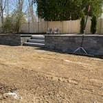 Pool filled in wall built with hydro seeding