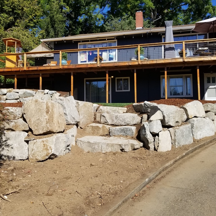 Boulder retaining wall