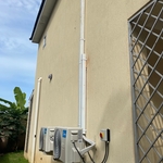 Outside view with exposed lines covered with molding