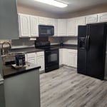 Kitchen Cabinets fireplace and front door repainted