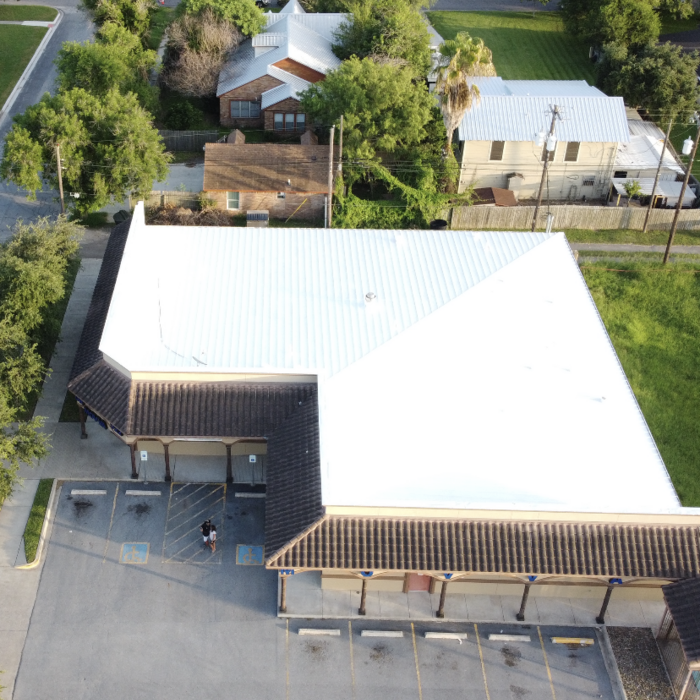 Full Silicone Sealant Roofing System.