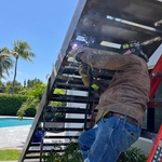 Aluminum staircase and concrete wall design