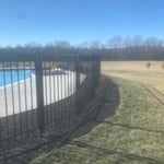 Aluminum fence around swimming pool
