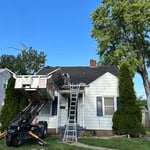 In the process of tearing off asphalt roof.