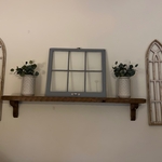 Floating shelf and decorative end pieces