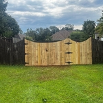 Reinstalled fence panels. Replaced old gates with new ones.