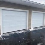 2 9x7 raised panel garage doors made by garage with lifetime warranty on panels. Also installed 2 lift master operators also life time warranty