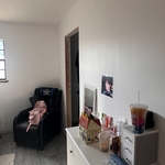 We remodeled this room by first getting rid of the popcorn then applying mud, texturing it, and finally painting it this changed the look of the room and made it look much better than before.