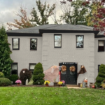 This home had old orange colored brick we updated with a light gray and black trim