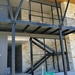 2 in by 4 1/2 in thermal brake anodized aluminum metal system to accept one inch thick insulated glass.
