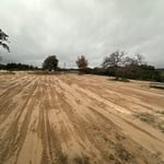 Backfilling and grading