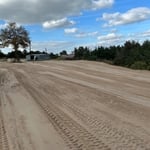 Backfilling and grading