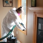 Removing loose mold spores with hepa vacuum.