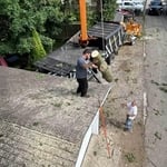 Large removal in limited space over electric and garage