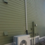 Mini split condenser. We are about to complete the covering for the line set.