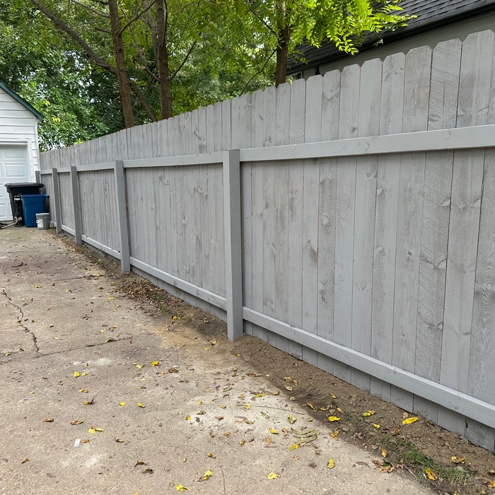 6’ dog ear privacy fence with three gates