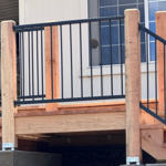 Custom built hand rails, built from roof welded, sanded, and painted, then hung.