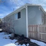 Rear left side of home