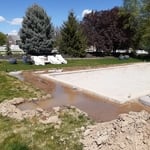 While digging a footing for the patio they cut the 1.5" mainline.