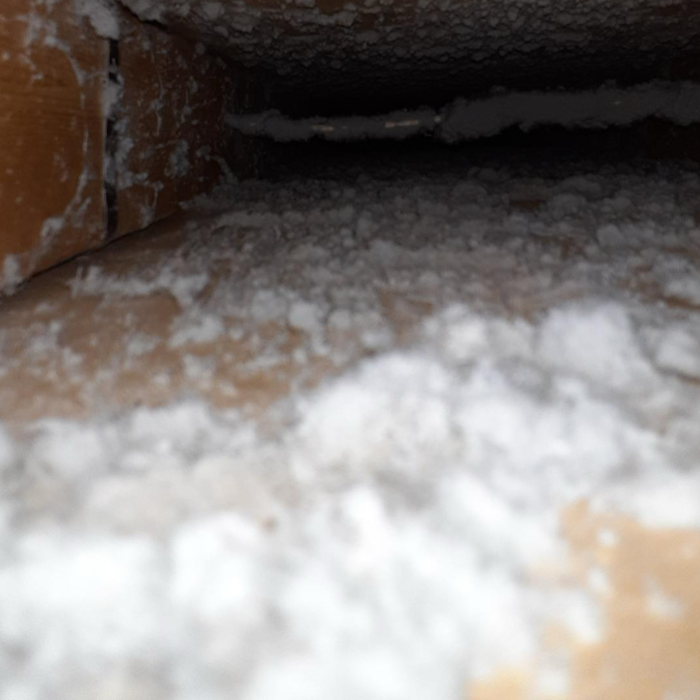 Dust in an attic from dirty ductwork