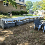 Nicolock Paver Patio with Radial Firepit Pad and Walkway Plus Concrete Pad for Spa
