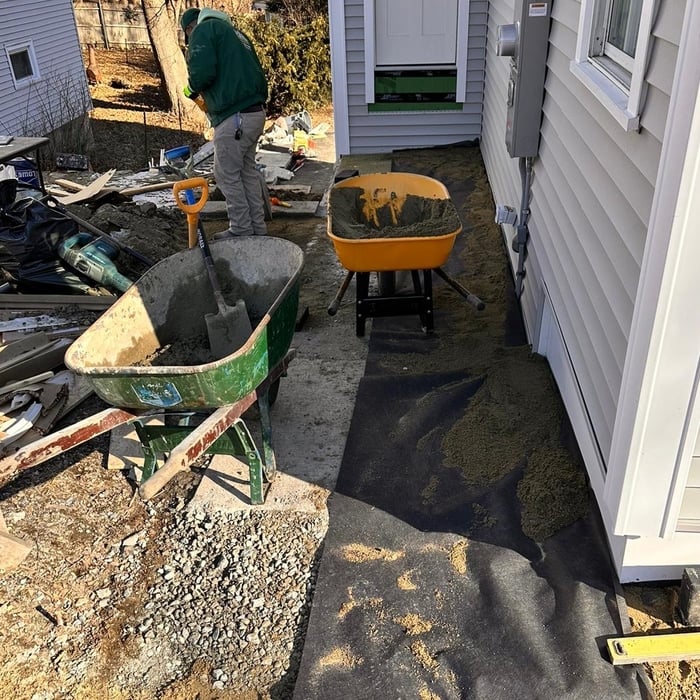 Walkway with retainer wall