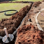 Drain line and dry well installation