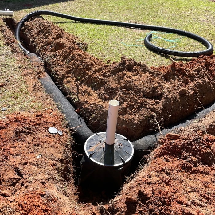 Drain line and dry well installation