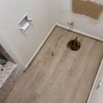 Here is a small bathroom room where lvp was installed on a different floor level