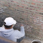 Tuckpointing around property