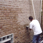 Tuckpointing around property