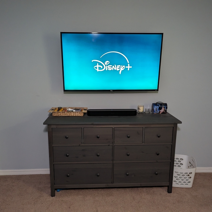 Bedroom TV on Full Motion Mount, power and av hidden in wall.