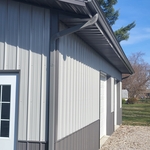 New gutters and gutter guards on pole barn.