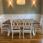 6’ trestle style table, bench and 4 double cross back chairs.