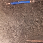 Finshed repair of water leak underneath slab