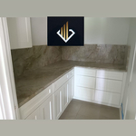 Taj Mahal polished Quartzite Countertop with full backsplash option.