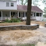 Stone patio and retaining wall