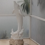 Statue by his pool