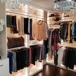 Boutique-style walk-in closet, meticulously crafted in pristine white. This elegant space features lighted rods and panels, providing the perfect illumination to showcase your wardrobe. Double Hanging and Long Hanging Areas: Accommodate all your clothing needs, from everyday wear to formal attire.