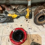 Closet ring was leaking, had bad cast iron pipe. Replaced with new closet ring and pipe.