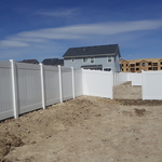 6' White Privacy Fence during installation