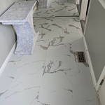 Luxury vinyl Tile (tear out, days of self leveler