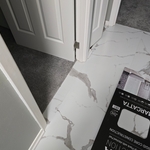 Luxury vinyl Tile (tear out, days of self leveler