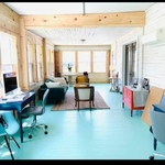 Turned old bedroom and part of old porch into a new office for the homeowner