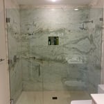 Frameless glass shower
